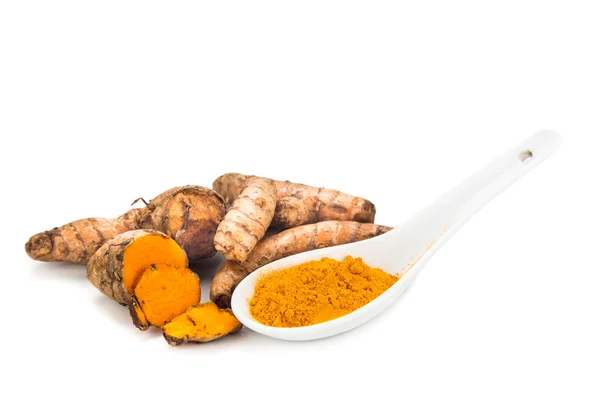 Turmeric roots and powder, healthy food with healing properties. — Stockfoto