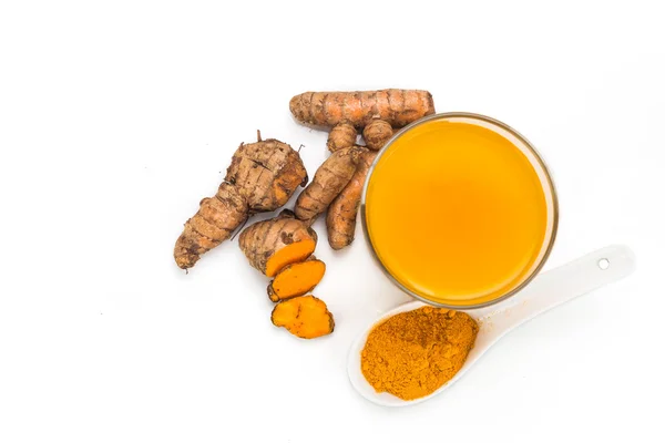 Healthy turmeric roots drinks in a transparent glass. — Stock Photo, Image