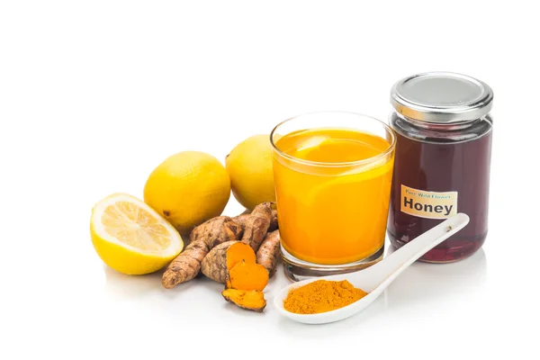 Racines de curcuma avec des boissons au citron et au miel, puissant bev guérison — Photo