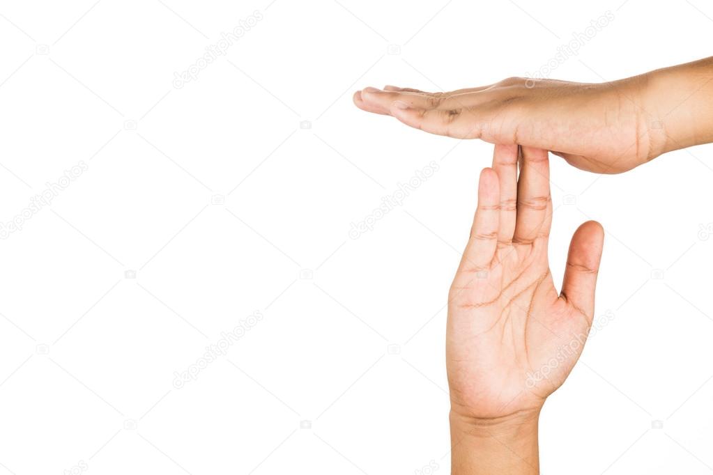 Hand gesturing time-out, against white background.