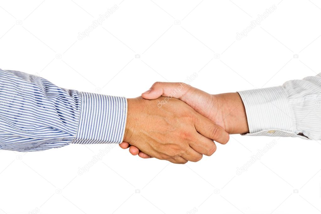 Firm hand shake by two person in formal wear.