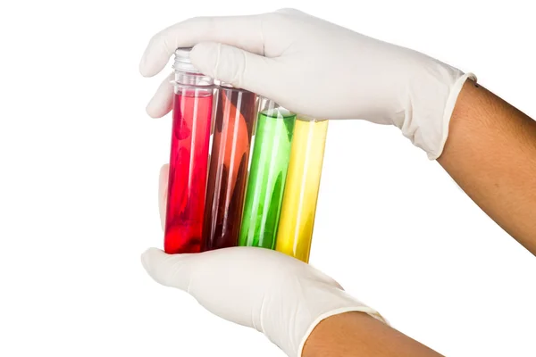 Hand in latex gloves holding test tubes with liquid. — Stock Photo, Image