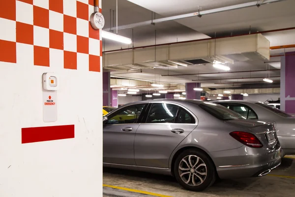 Emergency alarm panic button at car park complex for security