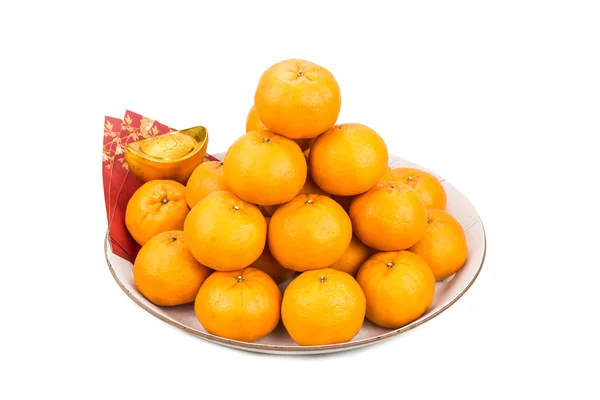 Mandarin oranges,  gold nuggets, red packets with good luck char — Stock Photo, Image