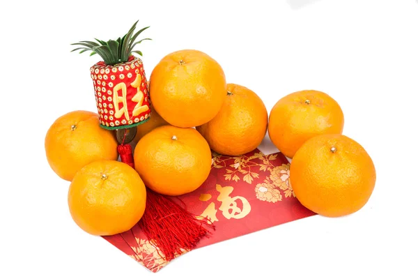 Mandarin oranges and red packets with Chinese good luck characte