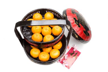 Mandarin oranges in basket with red envelope Good Luck character