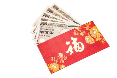 Red packet with Good Fortune character contains Japanese Yen currency