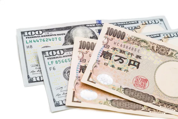 Fechar a nota de moeda do iene japonês contra o dólar americano . — Fotografia de Stock