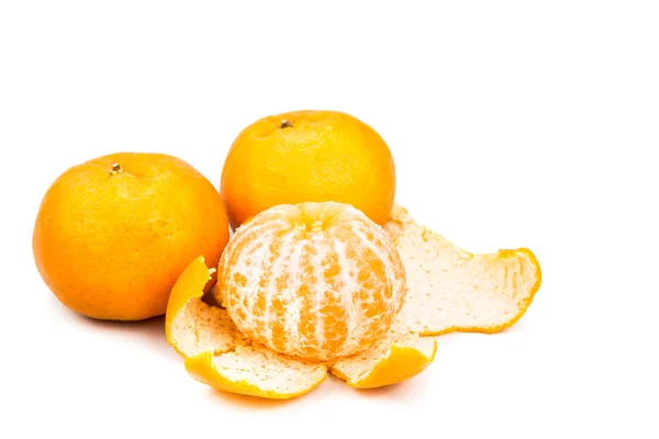 Peeled sweet and juicy mandarin oranges on white background — Φωτογραφία Αρχείου