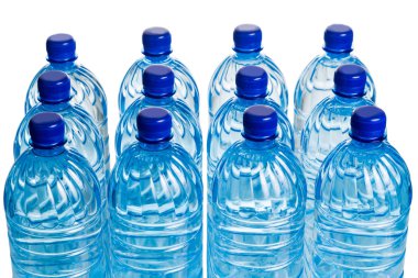Closeup on rows of mineral water in plastic bottle