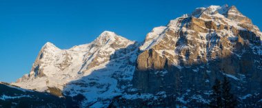 View from Muerren, a village in Switzerland to the mountains Jungfrau and Eiger