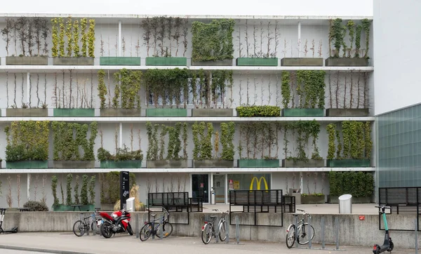 Basel, Switzerland - March 21st 2021: Green facade of Stuecki centre