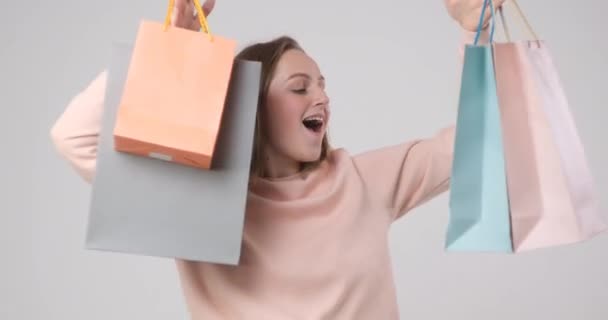 Cute Girl Enjoys Shopping — Stock Video