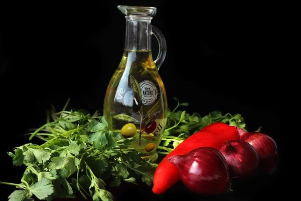 Pimientos rojos, verduras y aceite Imagen de stock