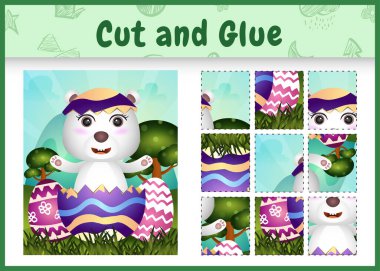 Çocuk masa oyunu kes ve paskalya temalı yumurta içinde şirin bir kutup ayısıyla yapıştır.