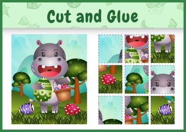 Çocuk masa oyunu, paskalya temalı, elinde kova yumurta ve paskalya yumurtası olan tatlı bir su aygırı ile kes ve yapıştır.