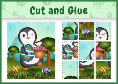 Çocuk masa oyunu, paskalya temalı, elinde kova yumurta ve paskalya yumurtası tutan sevimli bir penguenle kes ve yapıştır.