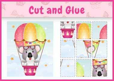 Children board game cut and glue with a cute koala on hot air balloon