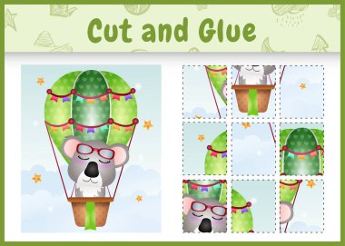 Children board game cut and glue with a cute koala on hot air balloon
