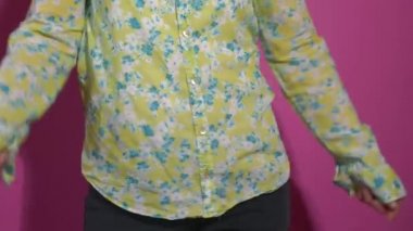 Happy person dancing in bright colors