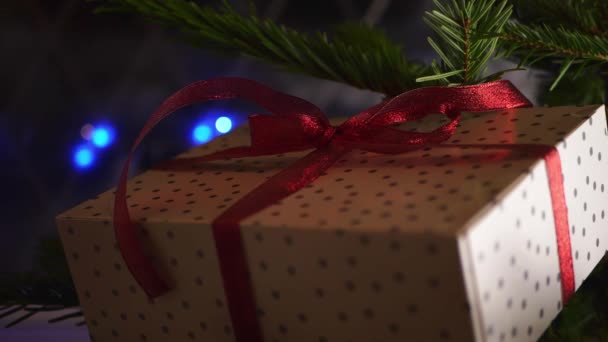 Christmas gift in a Christmas tree — Stock Video
