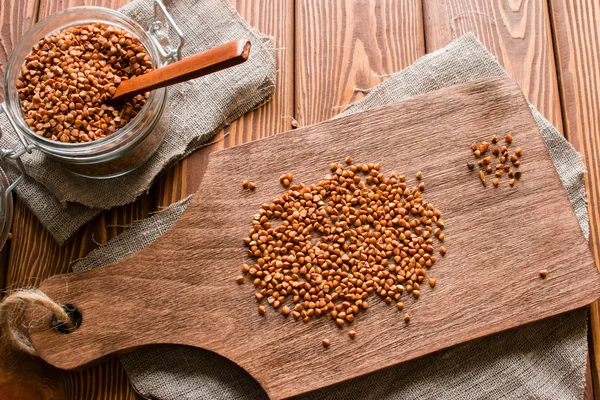 good or bad buckwheat groats on a cutting board