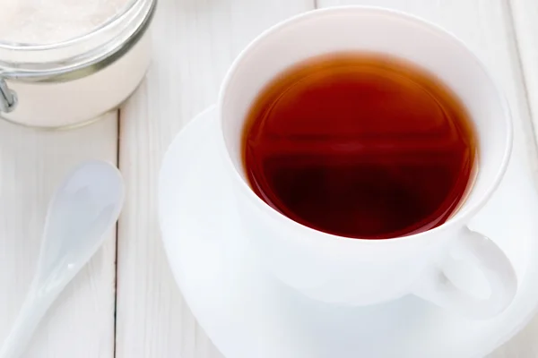 Λευκό φλιτζάνι τσάι και ζάχαρη — Φωτογραφία Αρχείου