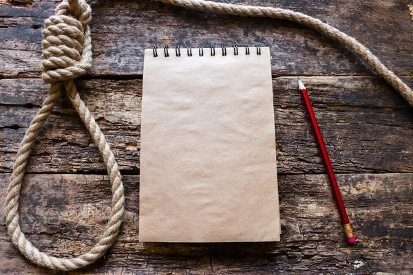 Cuaderno y un bucle para el suicidio —  Fotos de Stock