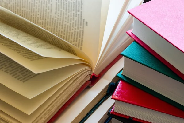 Stack of books and open books — Stock Photo, Image