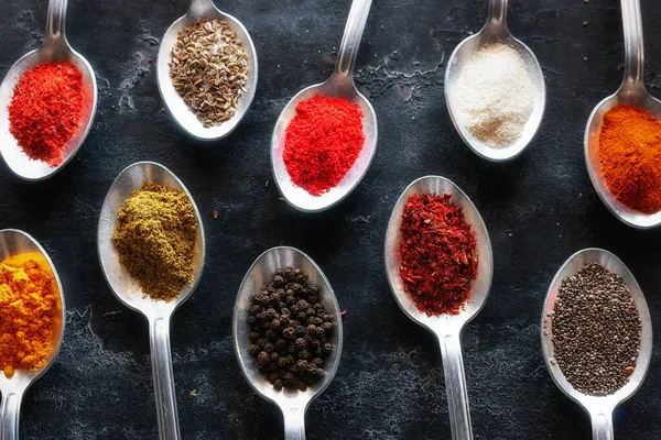 Spices Herbs Tablespoons Black Kitchen Table Close — Stock Photo, Image