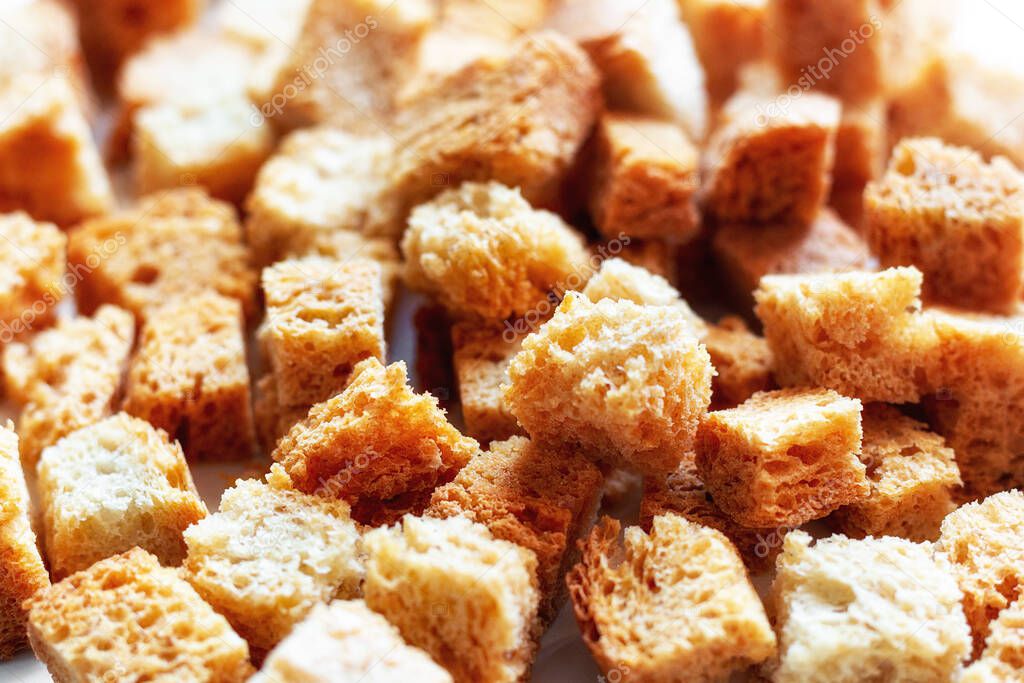 baked white bread croutons close-up