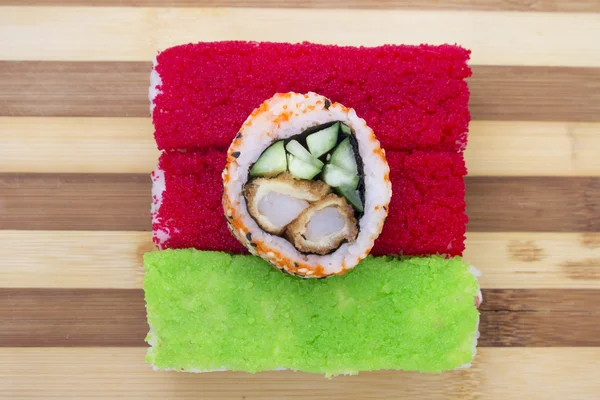 Red green rolls on a cutting board — Stock Photo, Image