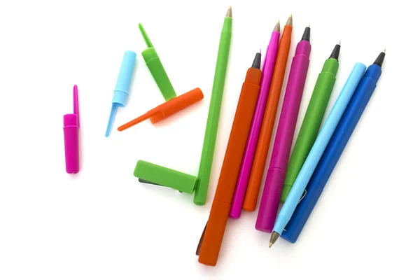 Кольорові ручки ізольовані над білим — стокове фото