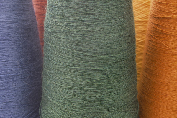 Blue and green background from threads and yarns
