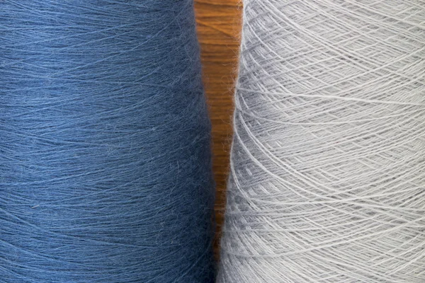 Fondo grigio e blu da fili e filati — Foto Stock