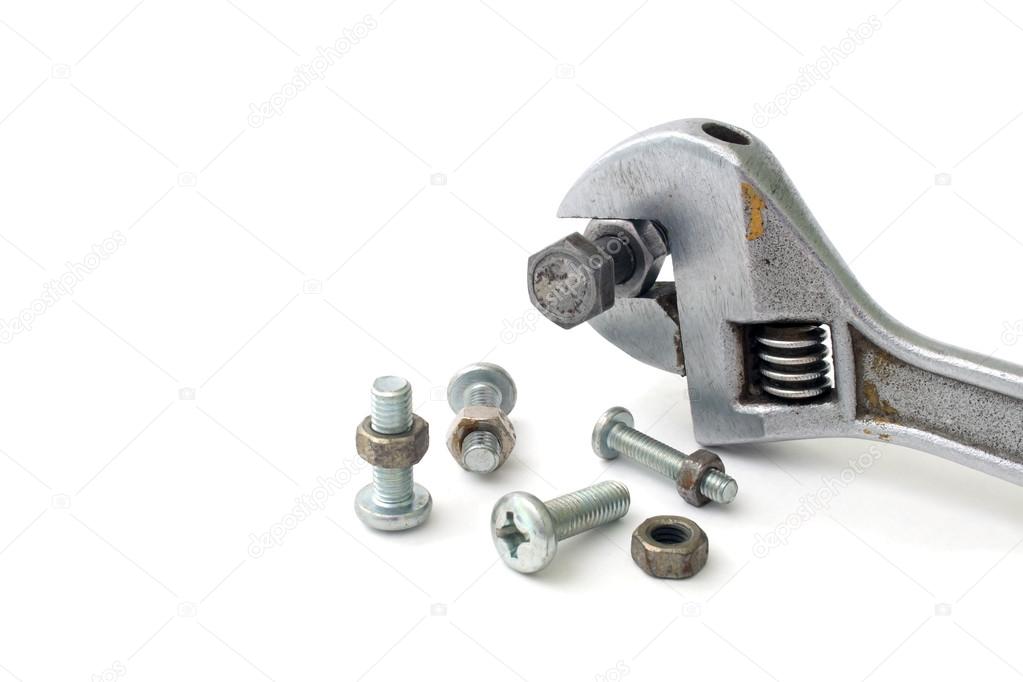 Wrench bolts and screws on a white background isolated