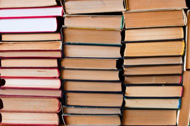 A stack of old books compiled in an upright position