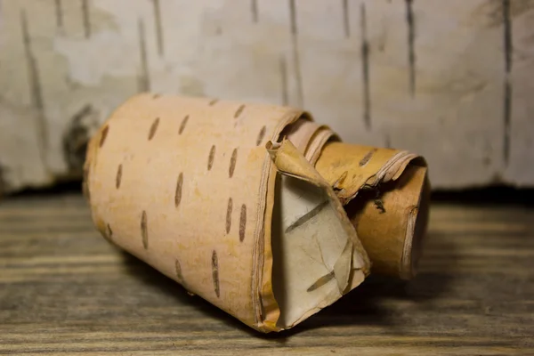 Roll of birch Bark on wooden — Stock Photo, Image