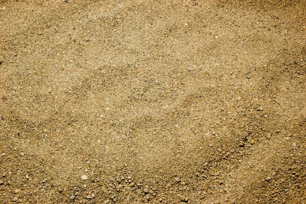 A homok textúráját a háttérben — Stock Fotó