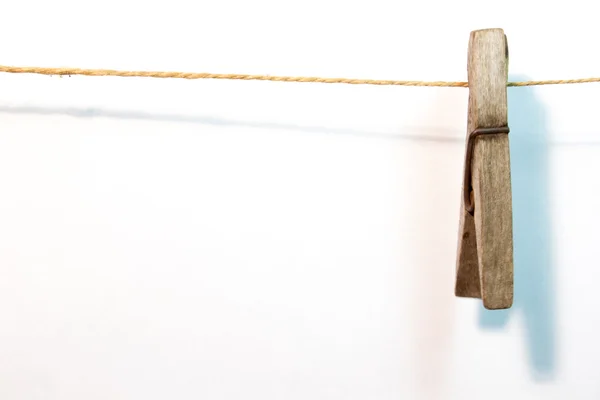 Blank sheet paper on wooden clothespin — Stock Photo, Image