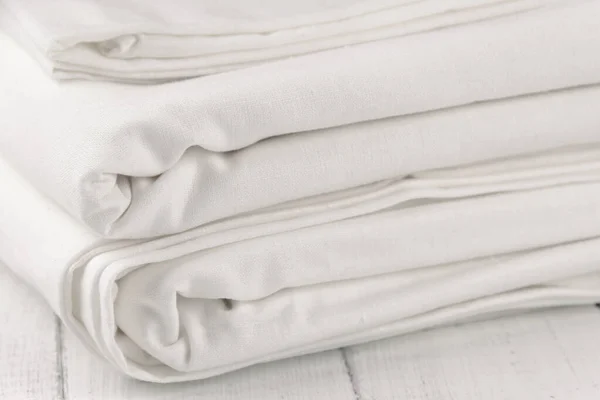 Stack Clean Bed Linen White Wooden Table Structure Fabric Bends Royalty Free Stock Images