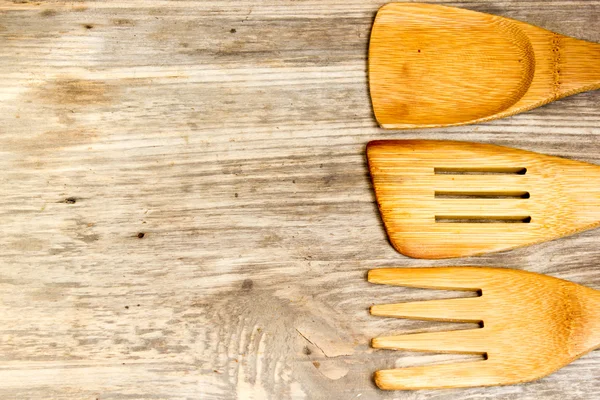 Wooden cutlery. Copy space to right. — Stockfoto