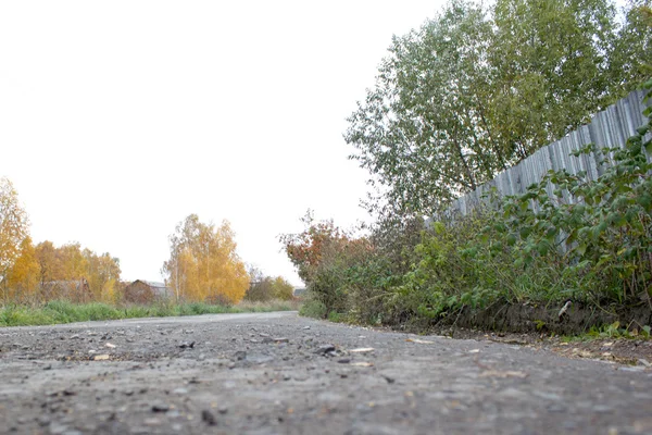 Season of bad roads. Autumn roads, road in the village — Stock Photo, Image