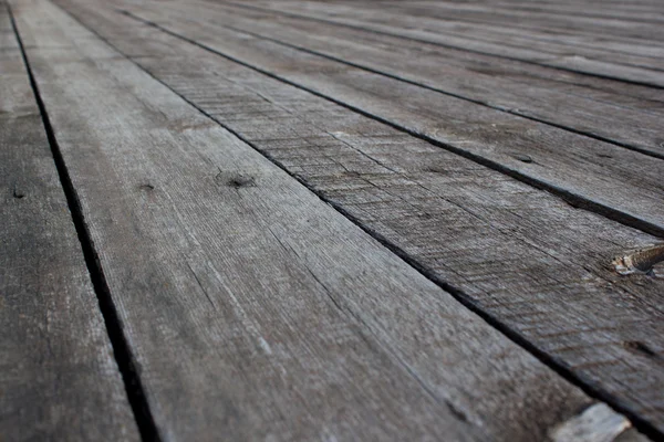 Old vintage planked wood table in perspective — Stock Photo, Image