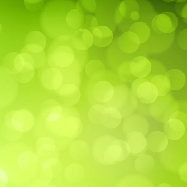 Lente groene bokeh abstracte lichte achtergrond. — Stockvector
