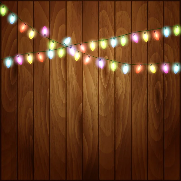 Fondo de Navidad con luces de Navidad textura de madera . — Vector de stock