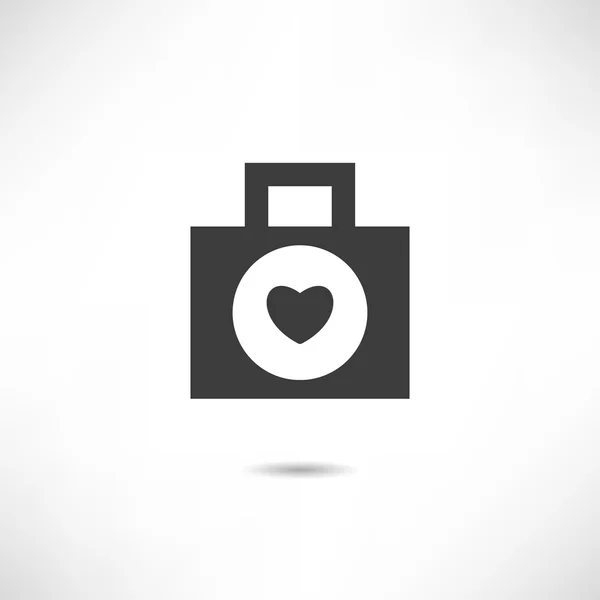 Heart in bag icon — Stock Vector
