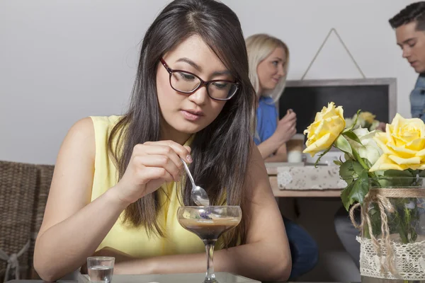 Asian woman has a lavender coffee — Stock Photo, Image