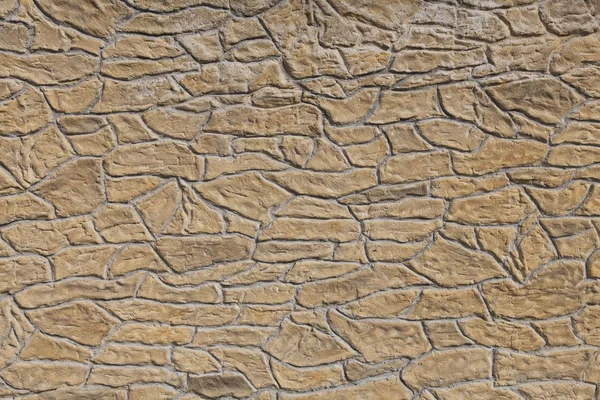 Kitschy cast stone wall — Stock Photo, Image