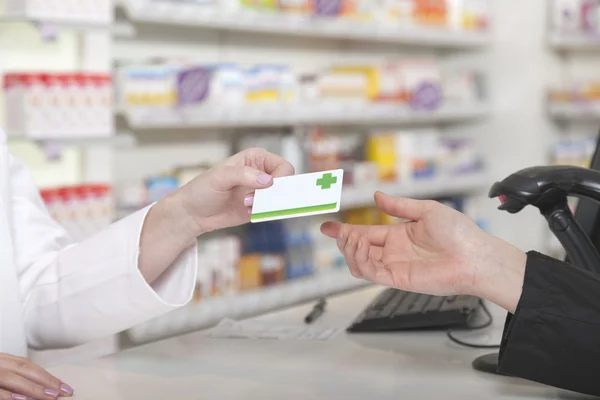 Card payment in pharmacy — Stock Photo, Image